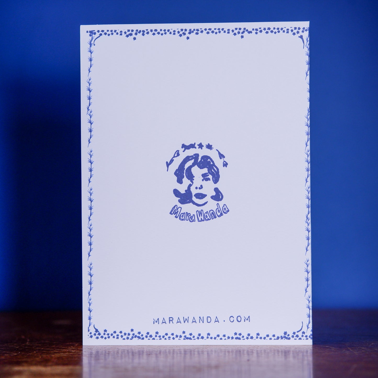 Puppy’s first Christmas elegantly illustrated navy blue Christmas scene on textured 5x7" card- for the dog and home lover