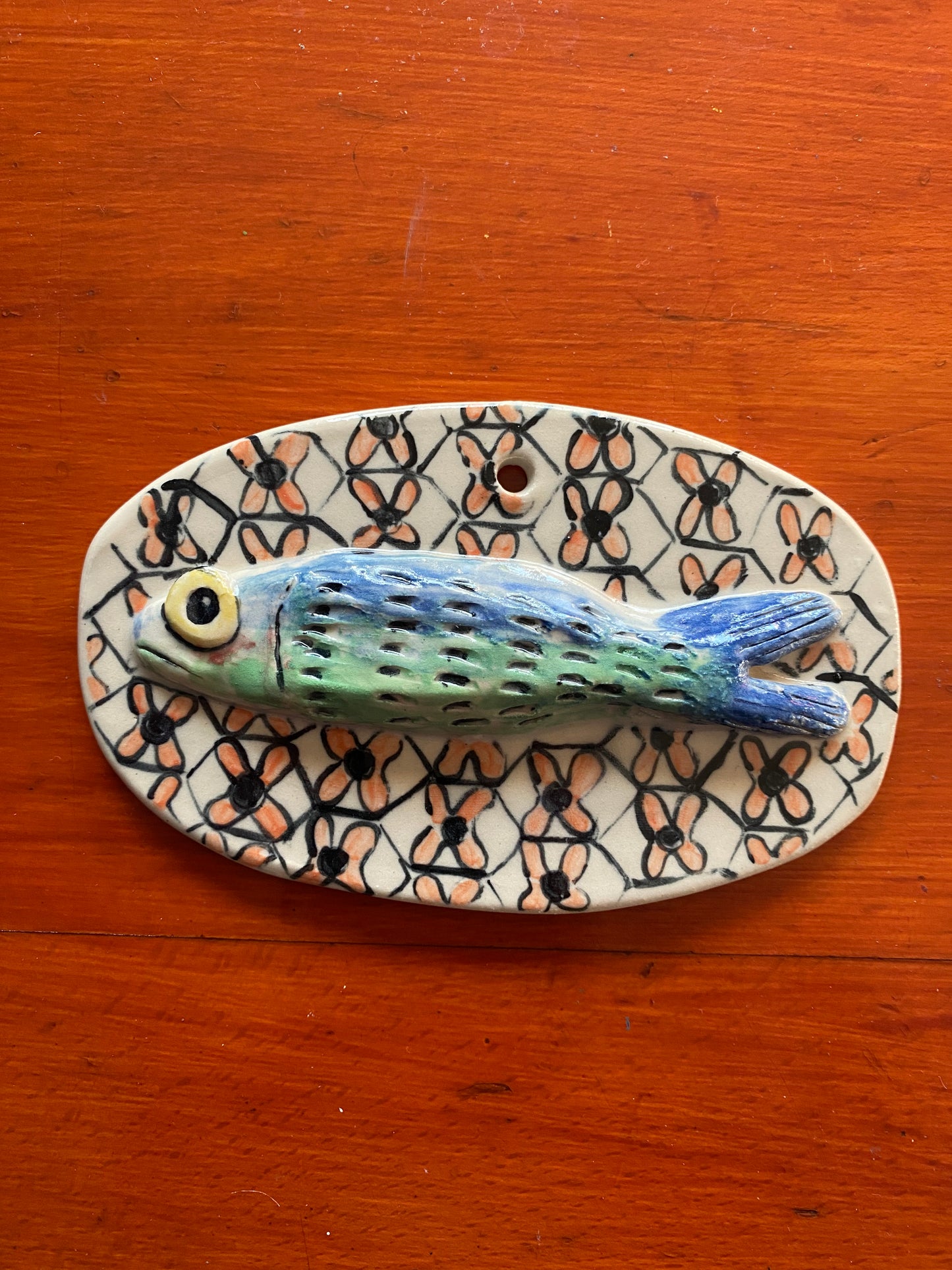 Handcrafted sardine with flowers ceramic tile wall hanging