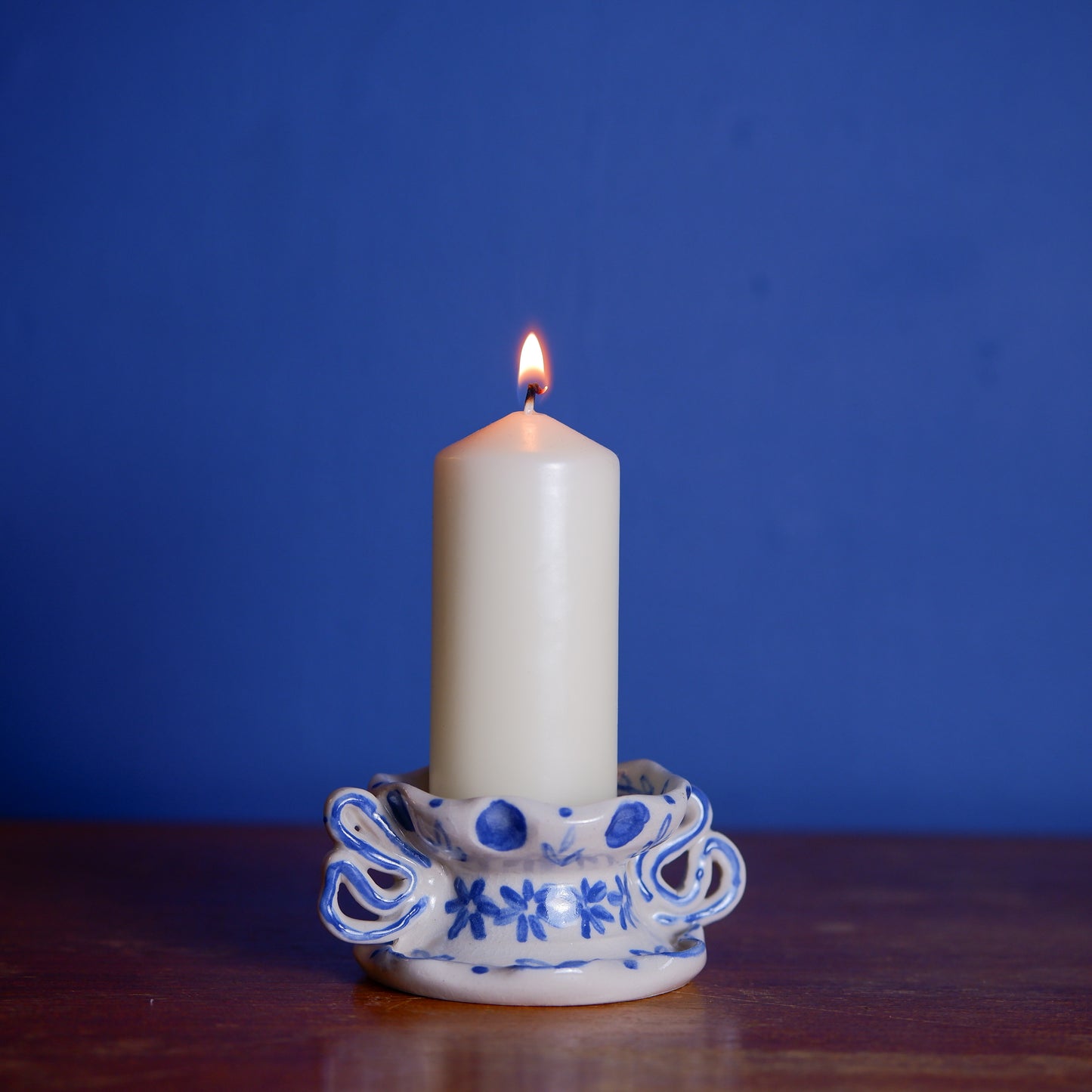 Delicate Ceramic Candle Holder with floral Motif