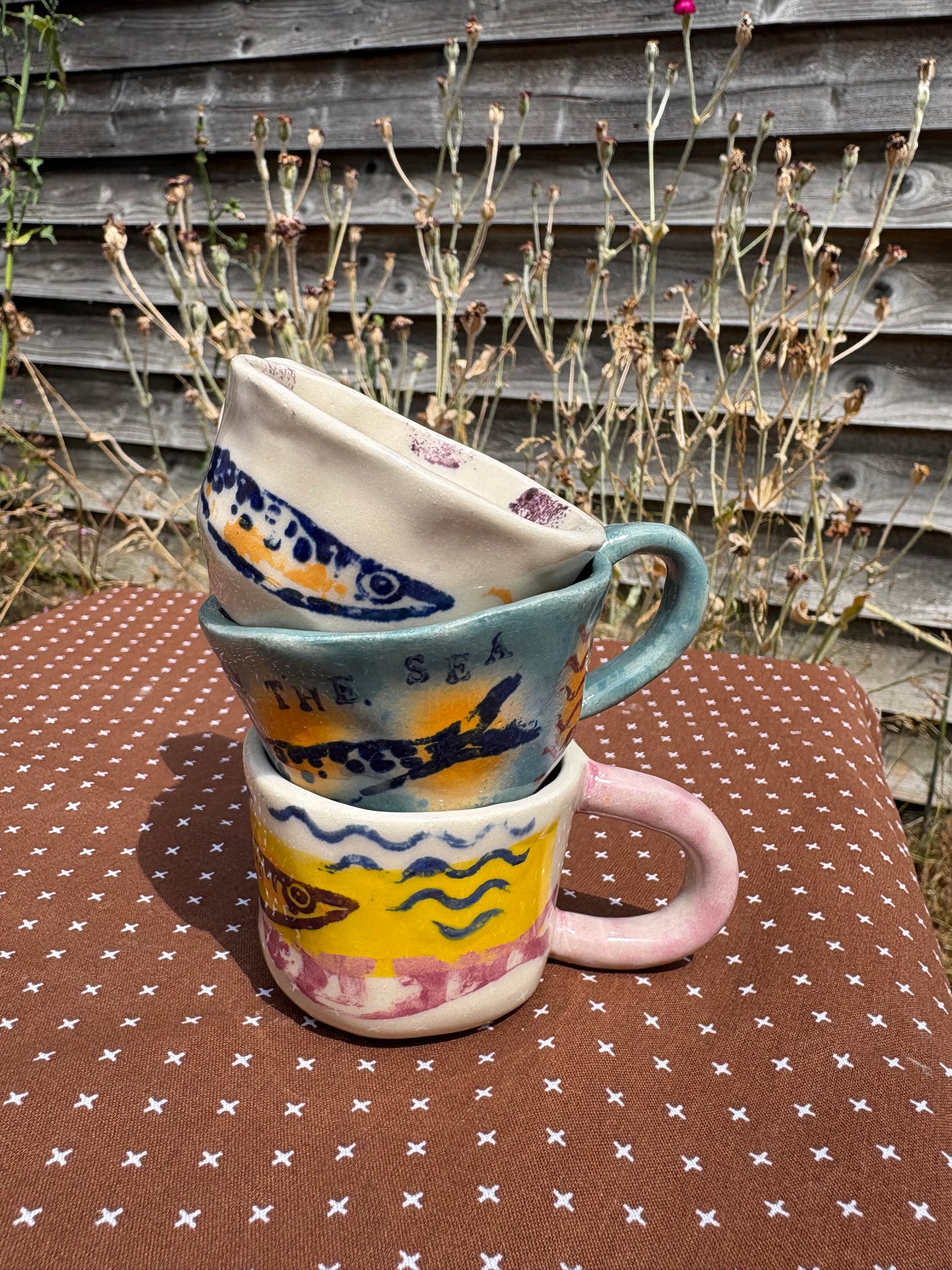 Espresso cups with sardines