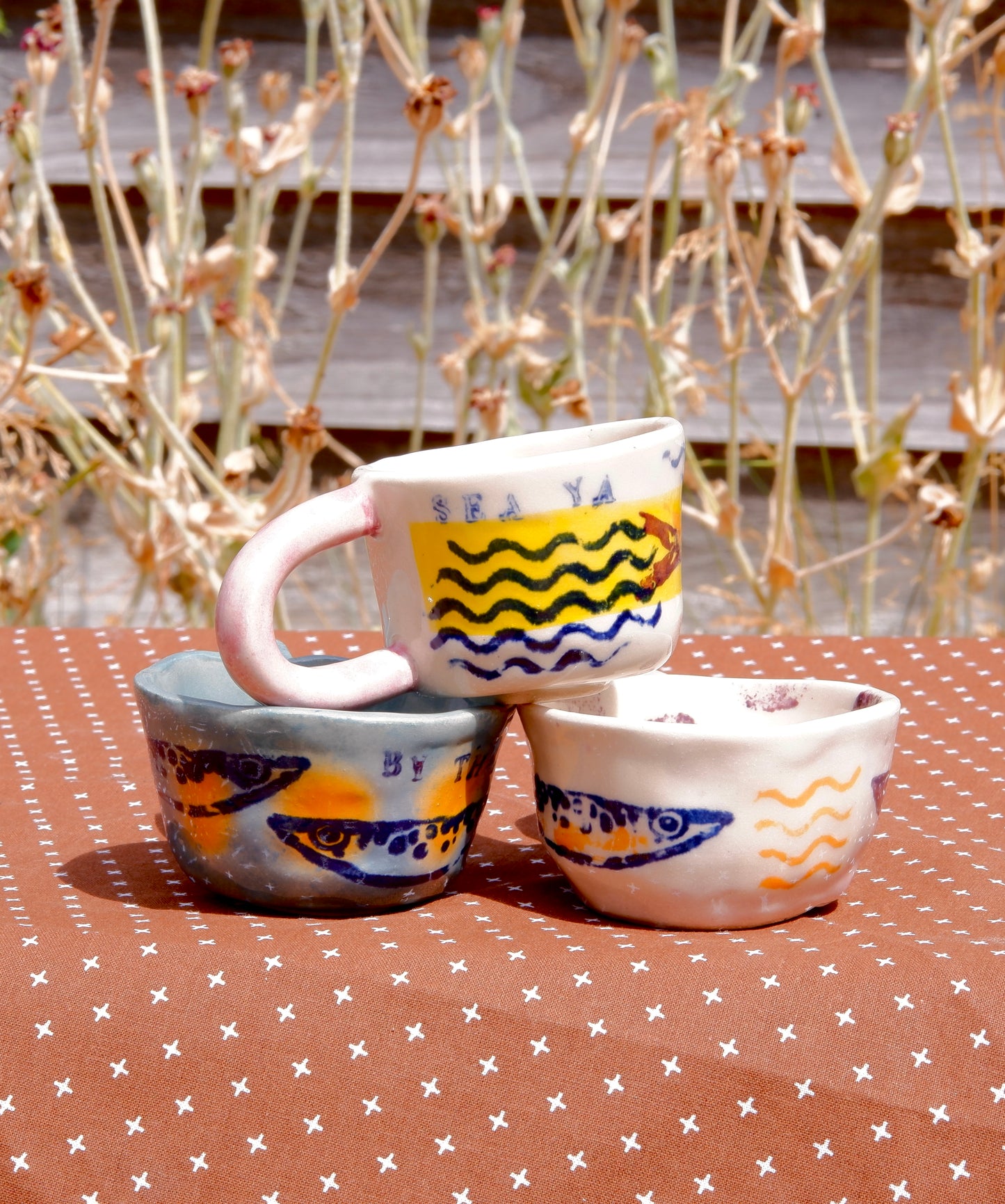 Espresso cups with sardines