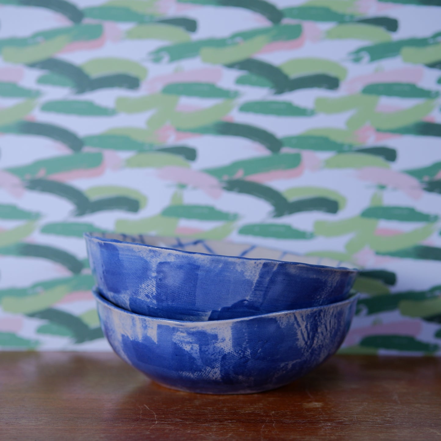 Handmade tomatoes and checks ceramic bowls