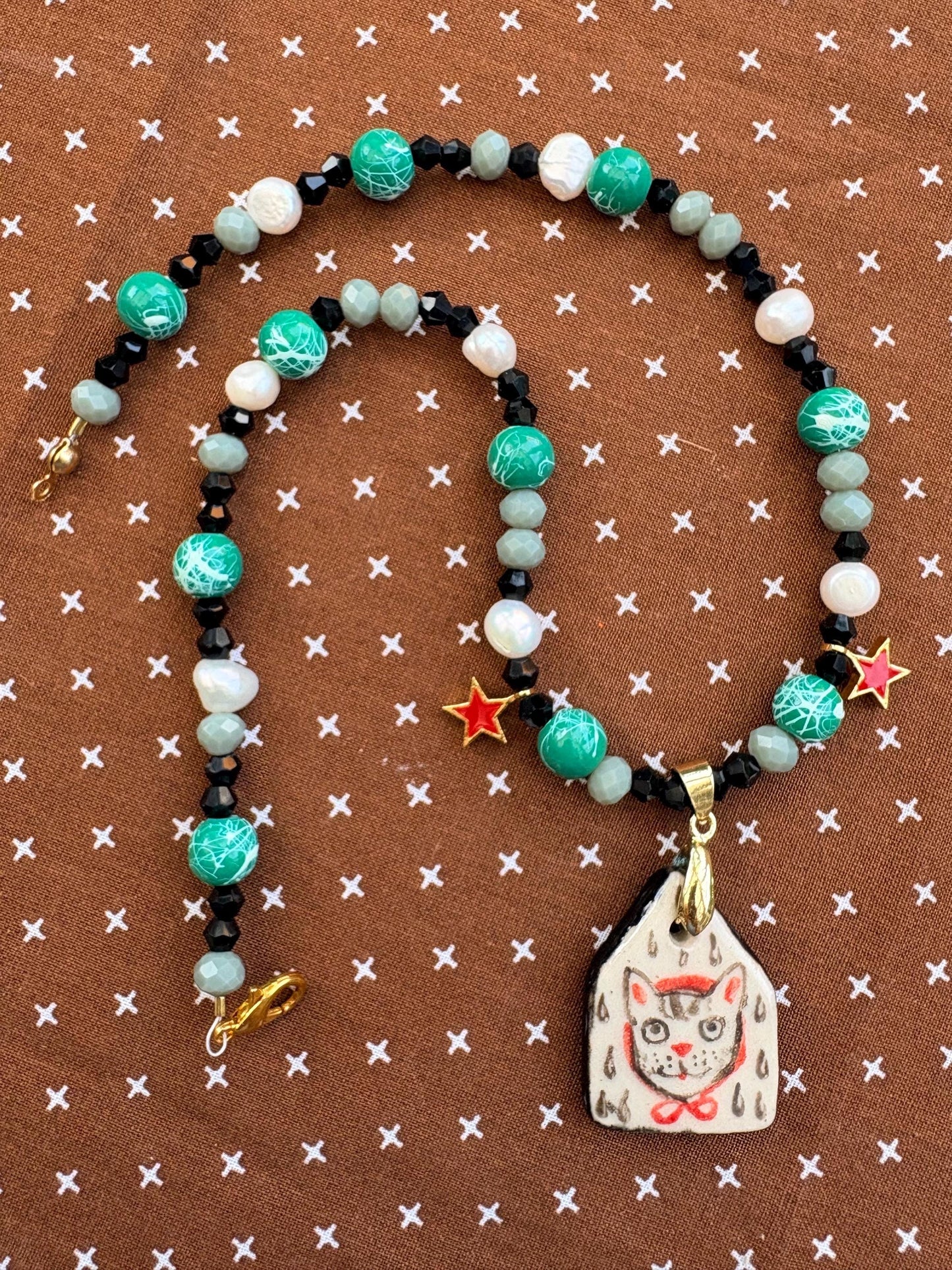 Cat with stars ceramic charm necklace