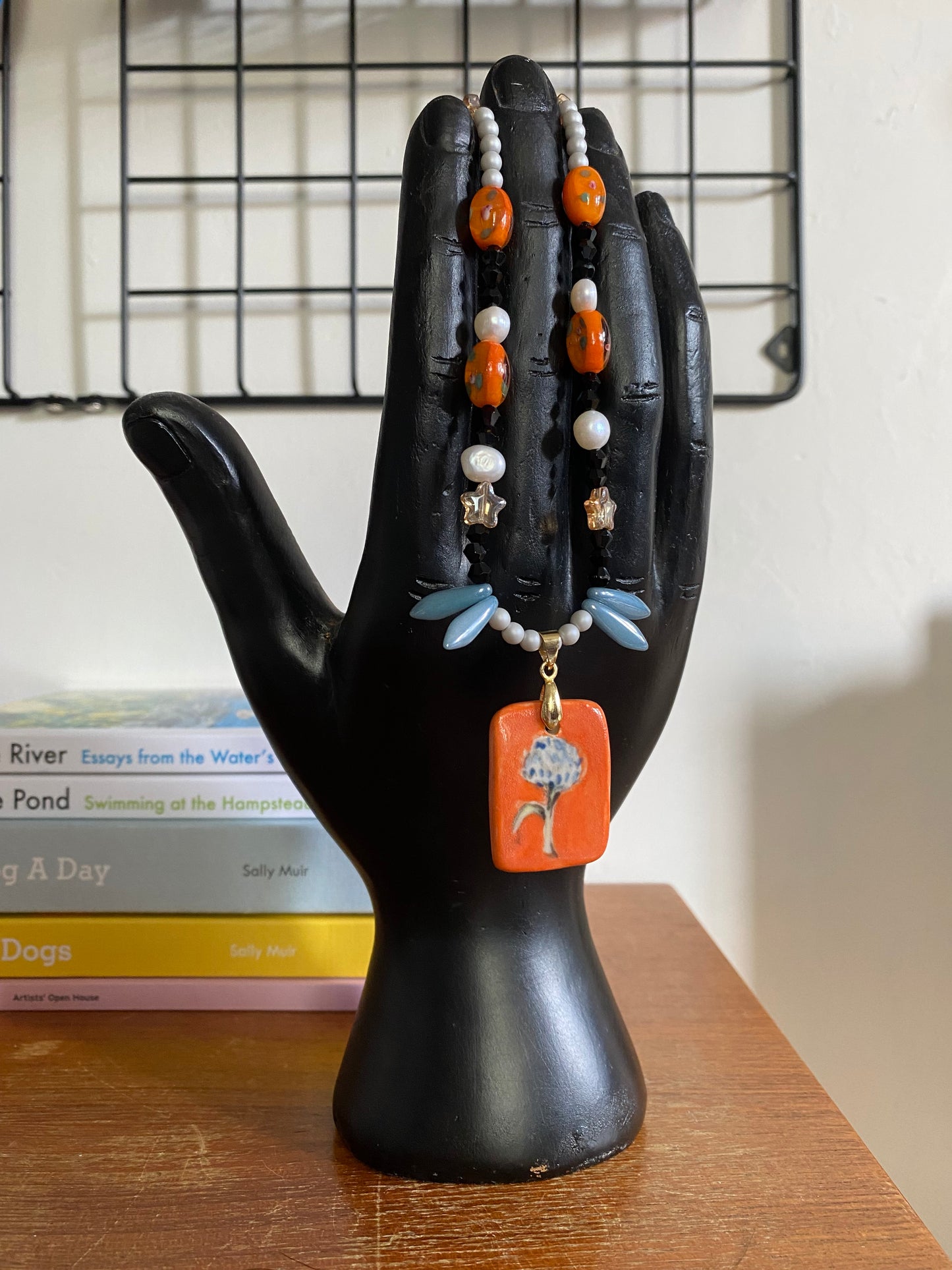 Dandelion orange and blue ceramic charm necklace with freshwater pearls and glass beads