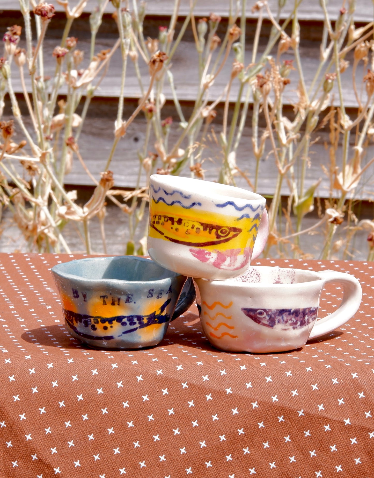 Espresso cups with sardines