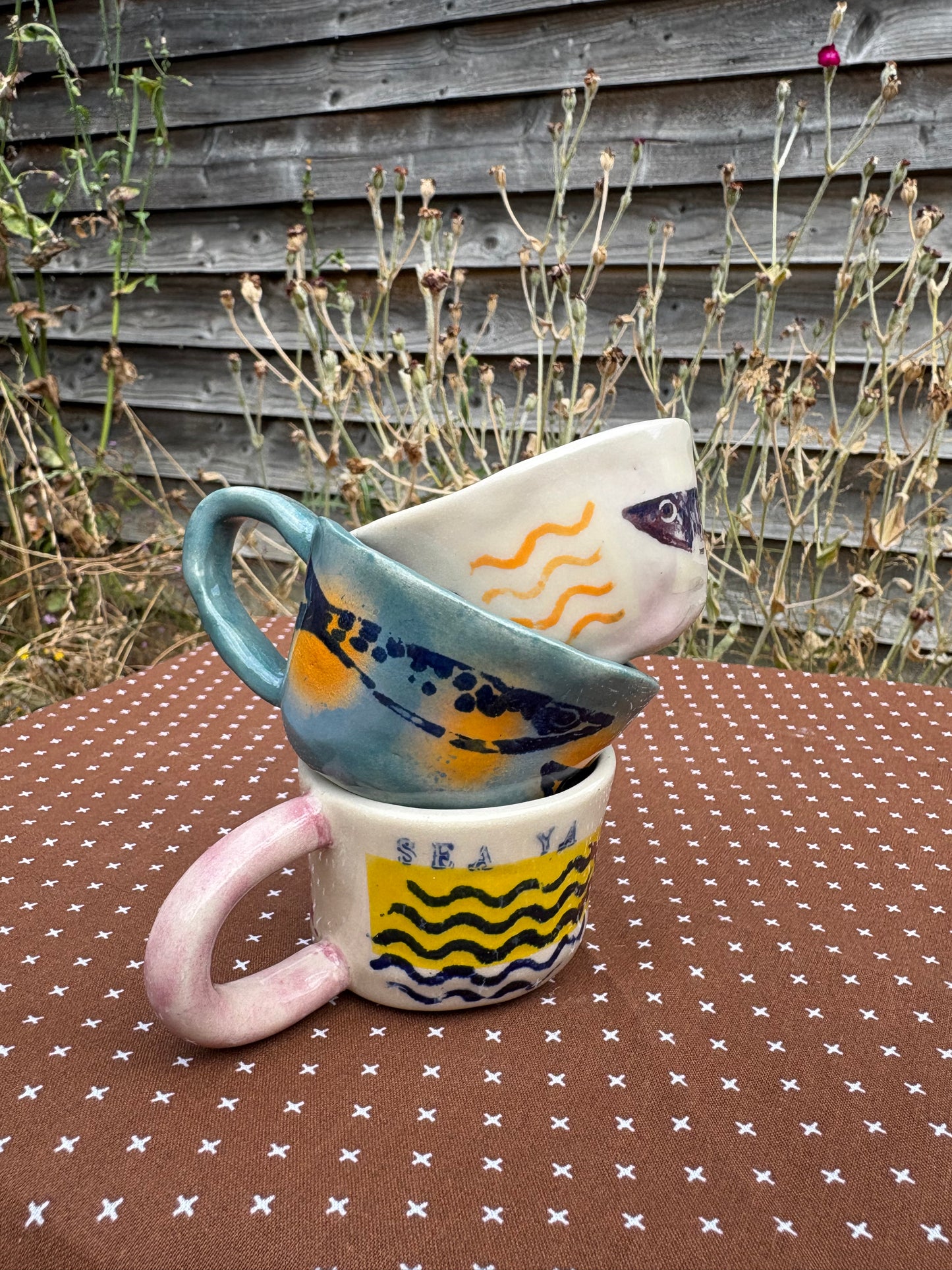 Espresso cups with sardines