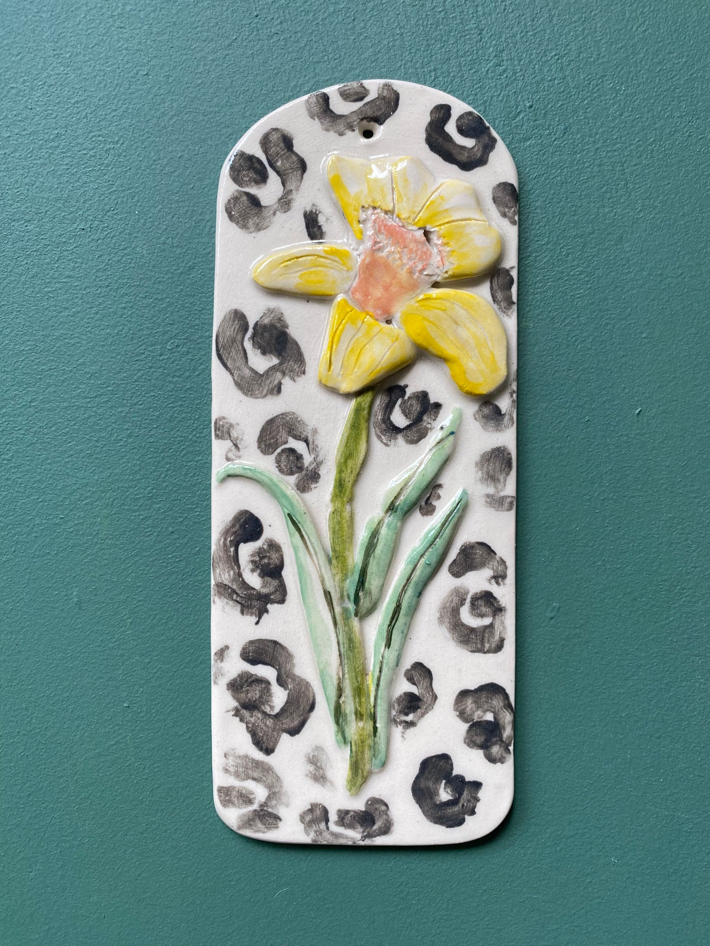 Handcrafted leopard print daffodil floral tile wall hanging