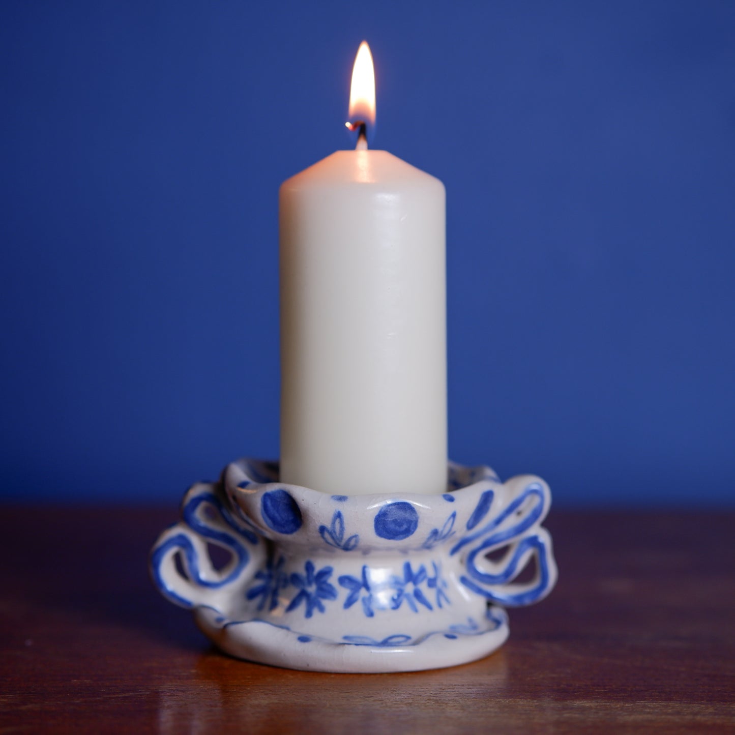 Delicate Ceramic Candle Holder with floral Motif