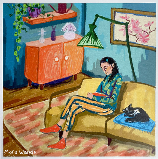 Girl Reading with Cat - cozy living room decor